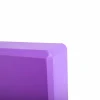 mor yoga bloğun yakın detay , yoga destek malzemesi